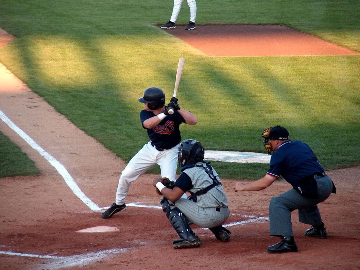 A batter with the Elmira Pioneers stands ready for a pitch at home plate